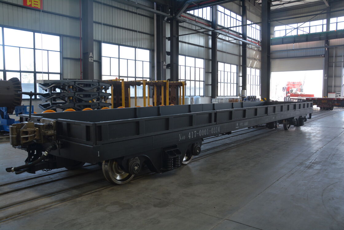 Railway Flat Wagon with 60 Tons Load Capacity, 100 Km/h Max Speed, and Coil Spring Suspension for Heavy Cargo Transport